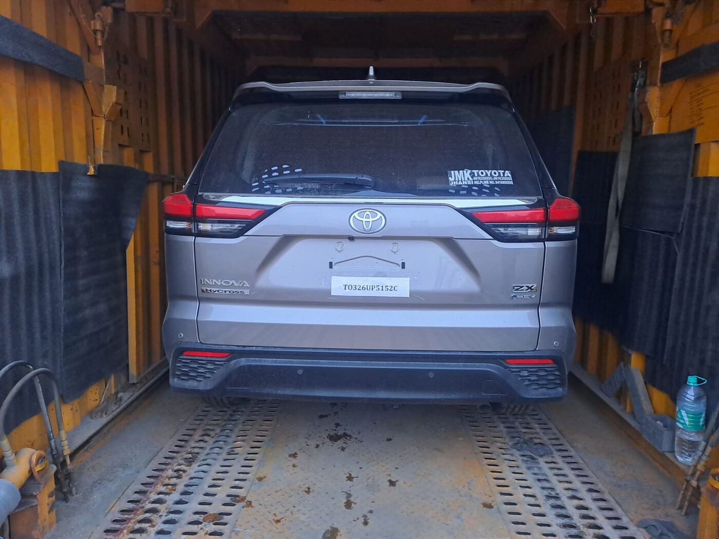 Toyota Innova Hycross secured inside a car carrier